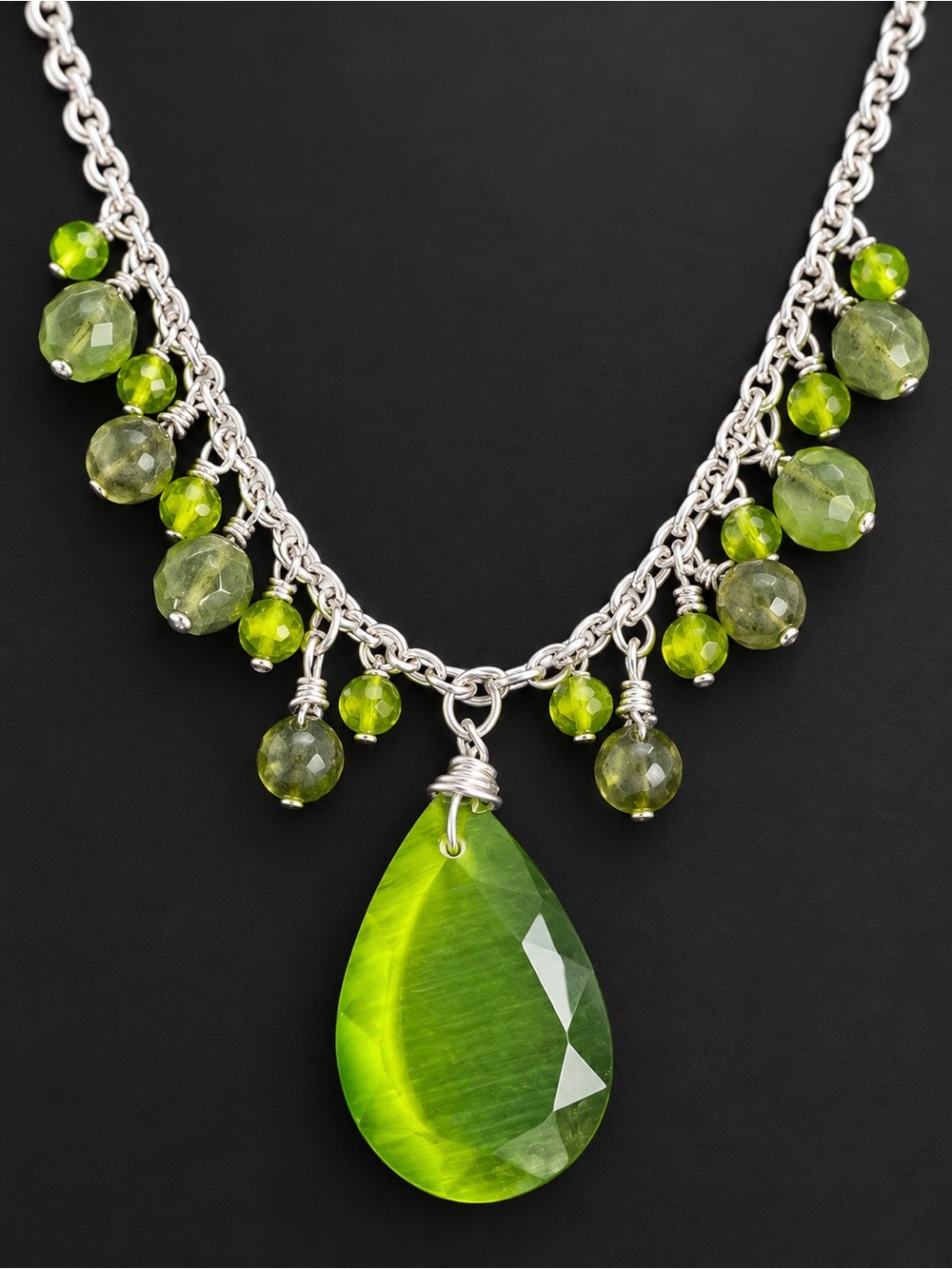 VTG bright green cat's eye glass beads and a large faceted drop pendant.